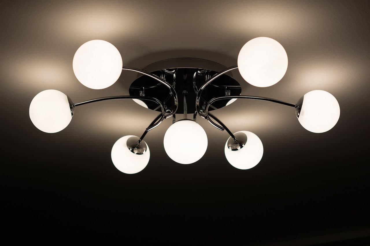 Modern light fixture hanging from ceiling